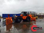 Трактор Кировец К-701 с отвалом и шнекоротором