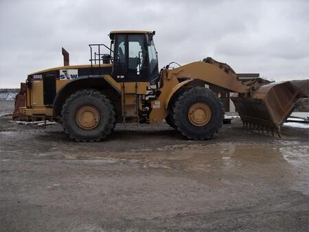Caterpillar 980G выполнения землеройных работ‚ погрузки различных материалов (горных пород, песка‚ щебня‚ грунтов, металлической стружки‚ древесной щепы и др.)