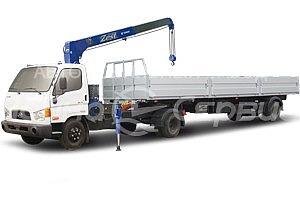 Седельный тягач с полуприцепом Hyundai-78 с КМУ Tadano