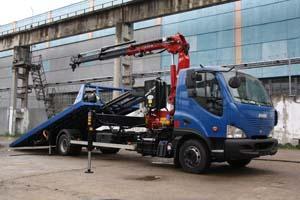 Эвакуатор со сдвижной платформой и КМУ на базе Avia D120