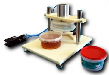 Полуавтомат для упаковки маринадов и солений из овощей и рыбы Полуавтомат для упаковки маринадов и солений из овощей и рыбы