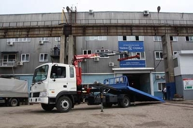 Эвакуатор со сдвижной платформой, бортами и КМУ Amco Veba 811T 2s на базе Hyundai HD-120