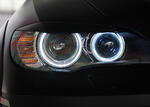 Подсветка габаритных колец BMW X-5