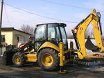 экскаватор-погрузчик CAT 428E.