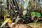 Больший харвестер John Deere 1270